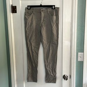 Gray slim fit pants. Full length.